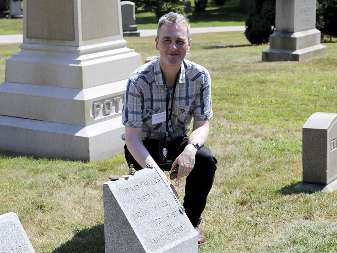 Paul Macelan at Lovecraft's grave